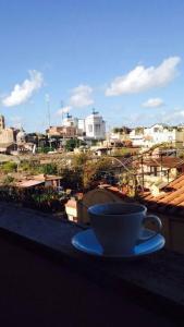 What are weekends for if not sipping coffees on the balcony overlooking beautiful Rome?